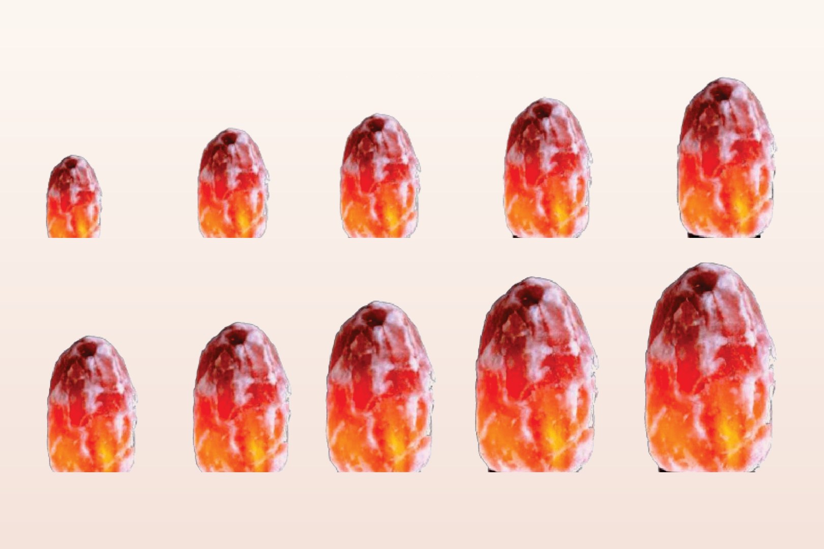 Himalayan pink salt lamps in graduated sizes, lit from within